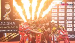 Belgium hockey team players celebrate after winning the FIH Men's Hockey World Cup