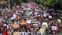 School and university professors, students, and staff walked out on Wednesday to protest education budget cuts