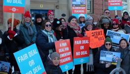 Thousands of striking teachers marched to Queen’s Park, adjacent to the provincial legislature, in the capital, Toronto.