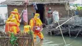 NDRF personnel in action in Assam’s Dhubri district. Photo Courtesy: Twitter/@NDRFHQ/PTI