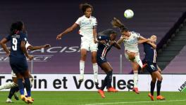 Wendie Renard of Lyon scores in the Women's Champions League semifinal