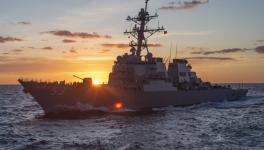 Arleigh Burke-class guided-missile destroyer USS John Paul Jones prepares to pull alongside aircraft carrier USS Nimitz (File photo) 