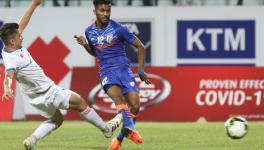 Farukh Choudhary of Indian football team scores against Nepal