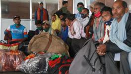 Non local laborers waiting for train inside railwaysation Nowgam . Photo by Kamran Yousuf