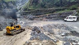 Road affected by flash flood, near Nachni, Pithoragarh District, Uttarakhand