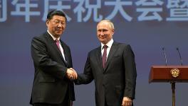 Vladimir Putin and Xi Jinping