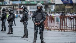 Ethiopian federal police officers stand guard as Muslims mark Eid al-Fitr in Addis Ababa 