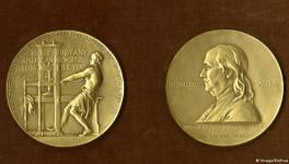 The Pulitzer Prize recognizes achievements in newspaper, magazine, online journalism, literature and musical composition within the US