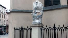 Lviv, Mar 06 (ANI): A view of a covered statue amid the Russia-Ukraine crisis at Rynok Square, in Lviv on Sunday.