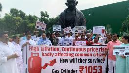 Congress MP Rahul Gandhi joins the Opposition's protest over the issues of inflation and price rise, near the Gandhi statue in Parliament 