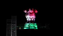 National Emblem cast on the roof of the New Parliament Building, lit up in tricolour on the eve of 76th Independence Day, in New Delhi on Sunday.