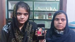 The bereaved family of Shafique, 45.