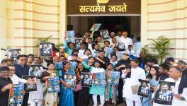 Grand Alliance legislators wearing black ribbons stage a protest against the Central Government over disqualification of Congress leader Rahul Gandhi from the Lok Sabha, during the Budget Session of Bihar Assembly, in Patna, Monday, March 27, 2023. image Courtesy: PTI