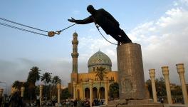 Statue of Saddam Hussein being toppled in Firdos Square after the US invasion of Iraq.