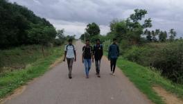 Students of Bommanahal Junior College return to their native village of Devagiri, Andhra Pradesh, after the bus was late.