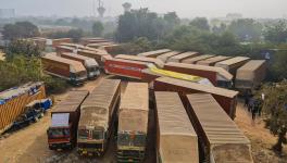 Trucks parked at a ground amid a strike of drivers over new provisions regarding hit-and-run cases under Bharatiya Nyaya Sanhita, in Gurugram, Tuesday, Jan. 2, 2024. (PTI Photo)(PTI01_02_2024_000315B)