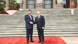 Chinese President Xi Jinping (L) received Russian President Vladimir Putin at the square outside the east gate of the Great Hall of the People before the welcome ceremony and talks, Beijing, May 16, 2024