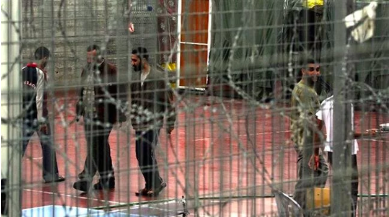 This file picture shows Palestinian prisoners in the yard of Israel's Megiddo prison.