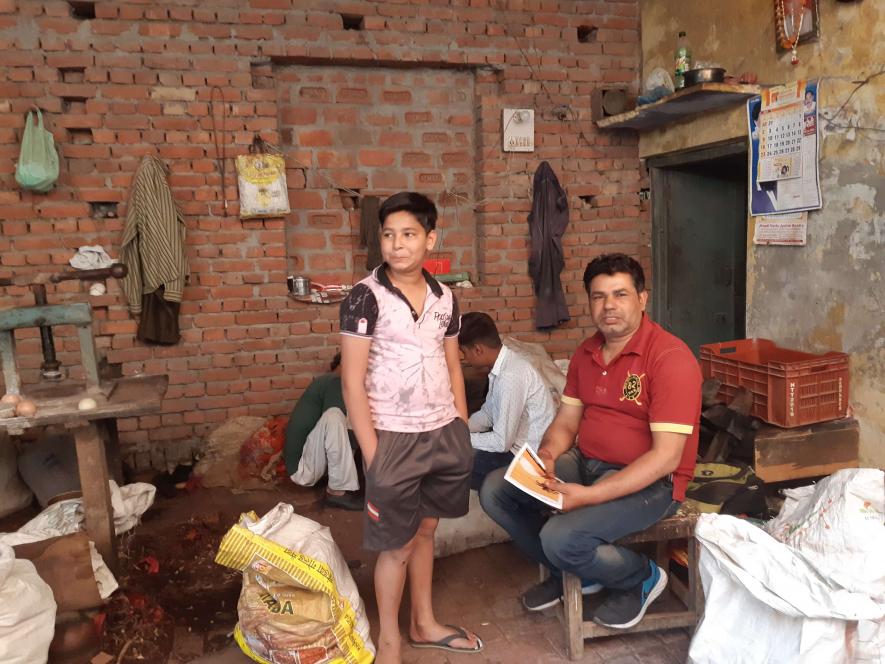 Jay Prakash and his son. Image Courtesy: Saurabh Sharma