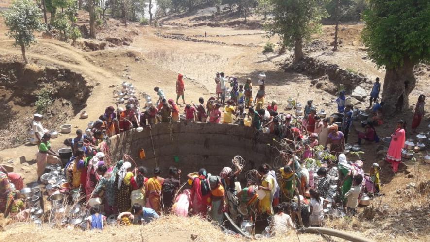 Women going down well to get water.