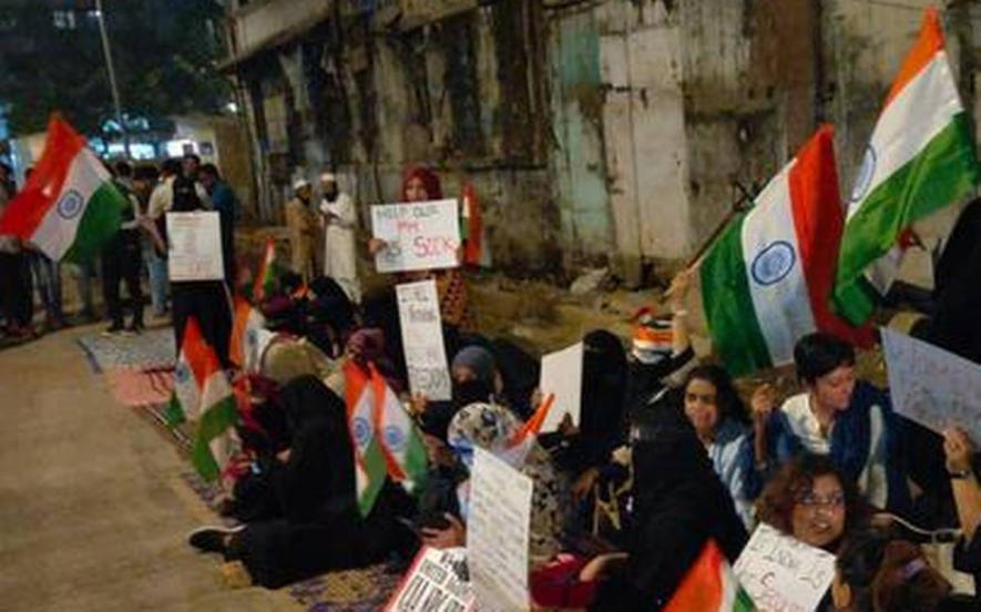 A group of women sit in protest against the Citizenship Amendment Act and NRC at Nagpada in Mumbai on January 26, 2020.