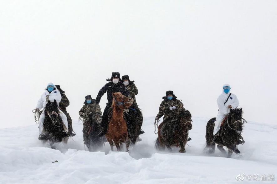 Chinese doctors in the Altai mountains.