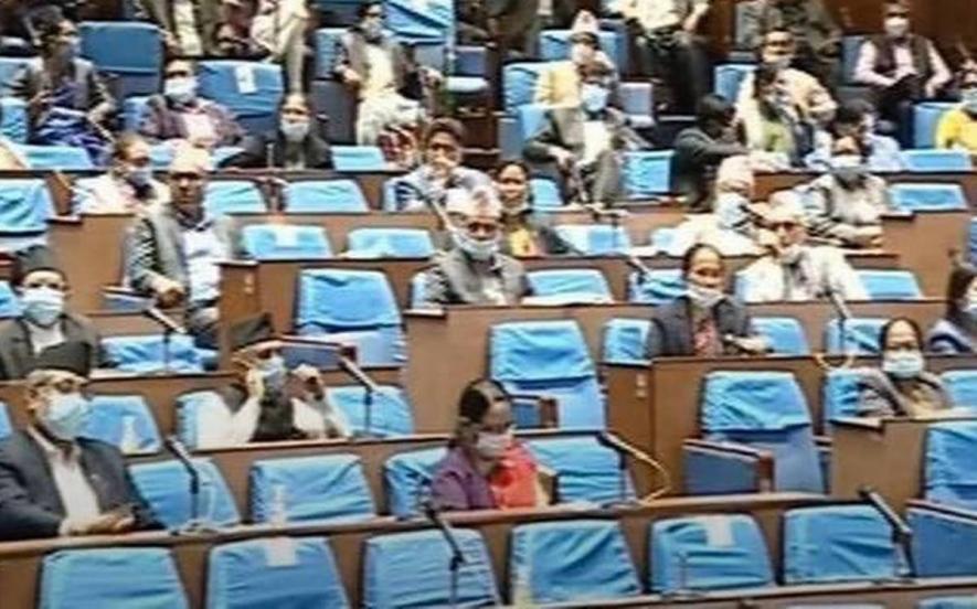 Members of the Lower House of Nepal’s Parliament applaud after the House unanimously passed a bill to approve the country’s new political map in Kathmandu on June 13, 2020. 