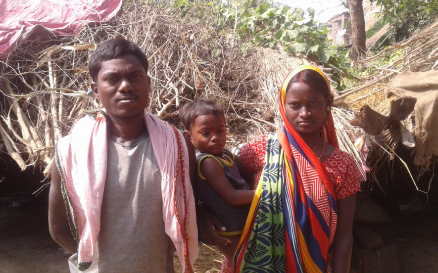 Anuj Manjhi and Saraswati Devi at their mud -thatched house