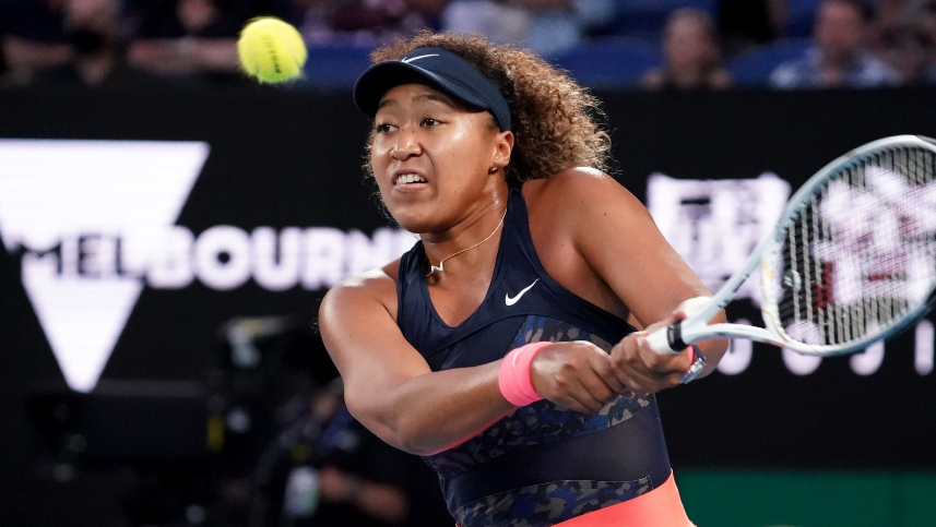 Naomi Osaka returns to Jennifer Brady during the Australian Open final