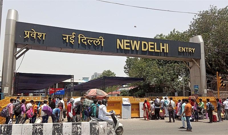 Stranded people rushing to New Delhi railway station to catch their train during fourth phase of the lockdown