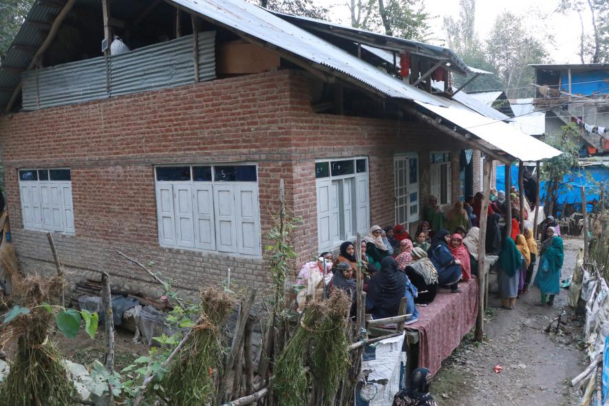 Locals wating for shahids body at his residance in Arvani village