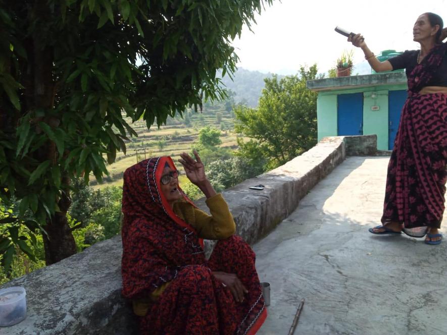 Nirmala Devi, requesting medicine from her neighbour