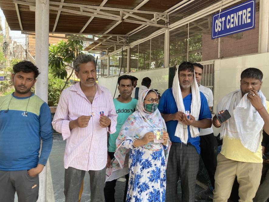 Relatives of those missing await for information at Sanjay Gandhi Memorial Hospital on Saturday afternoon. Image clicked by Ronak Chhabra