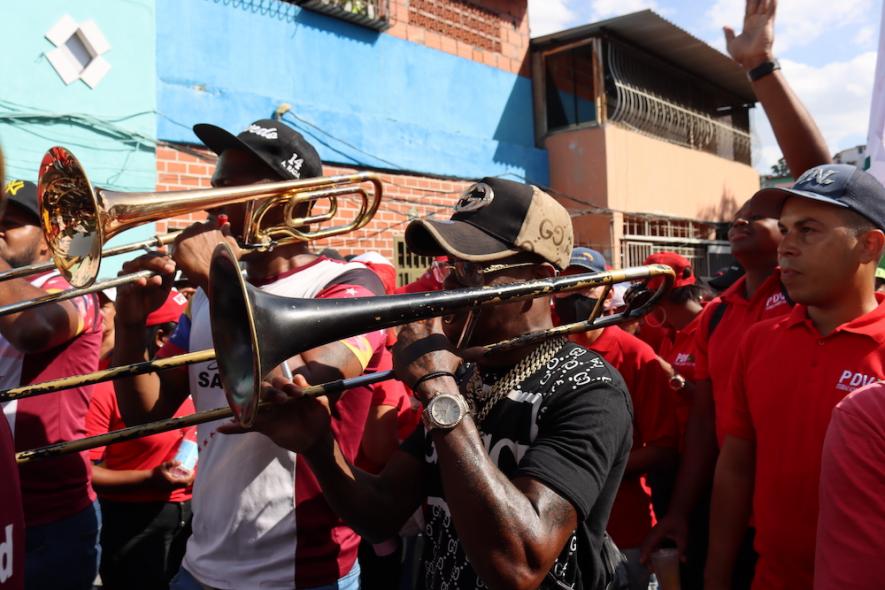 Musicians participate in the march to the 4F Mausoleum where Chávez’s remains were laid to rest. The development of national arts and culture has been put front and center in the Bolivarian Revolution. Photo: Zoe Alexandra