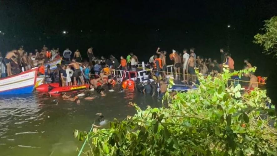 Rescue operation underway after a boat sank near Tuvalthiram beach, at Tanur area of Malappuram district, Sunday, May 7, 2023. At least 11 people got killed in the incident, according to officials. (PTI Photo)