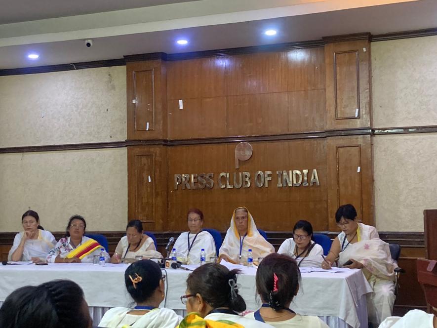 The delegates of the Joint Coordinating Committee for Peace of Imphal-based Khwairamband Ima Keithel address the media at the Press Club of India, New Delhi.