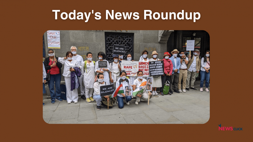 Members of the Women of North East India Support Network (WNESN) during a silent protest march in London, Wednesday, July 26, 2023. 