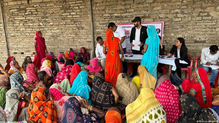 Dozens of widows gather to attend the legal camp that helps them in claiming financial compensation from the government