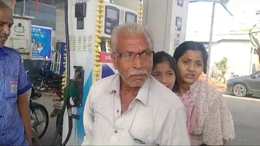 Mansingh Meena, farmer (grows paddy, wheat, and gram) (we met him at a petrol pump on the way to Raisen outside Bhopal city)