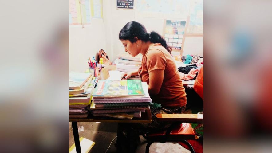 Ashwini Singh at her room studying