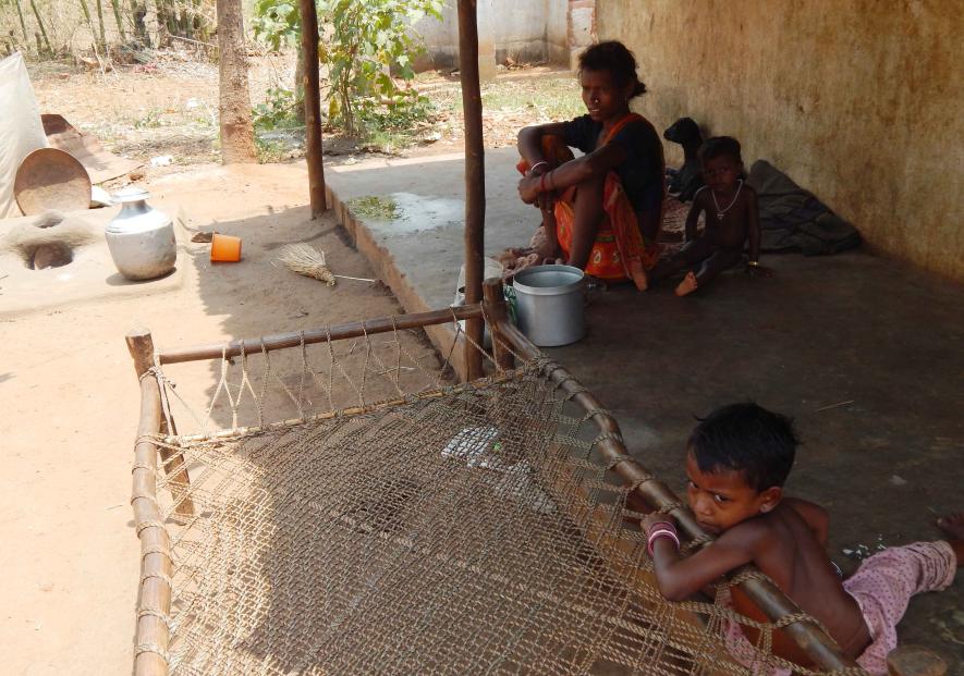 Jobless mother with her son and daughter at Jalhari village.