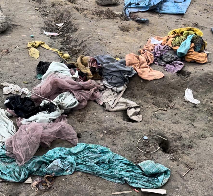 Burnt clothes and belongings of the Muslim slum dwellers that were attacked in the Ghaziabad, near Delhi.