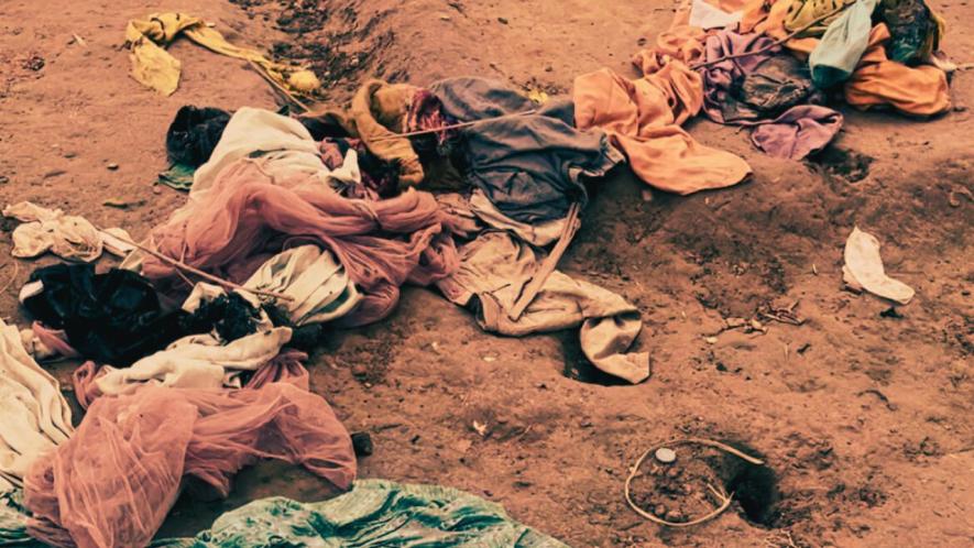 Burnt clothes and belongings of the Muslim slum dwellers that were attacked in the Ghaziabad, near Delhi.