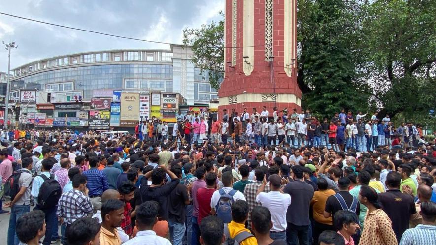 Members of Right wing Hindu organisations affiliated to ruling BJP/RSS blocking the main Clock  Tower Road demanding the release of Bajrang Dal leaders in Dehradun on Friday.