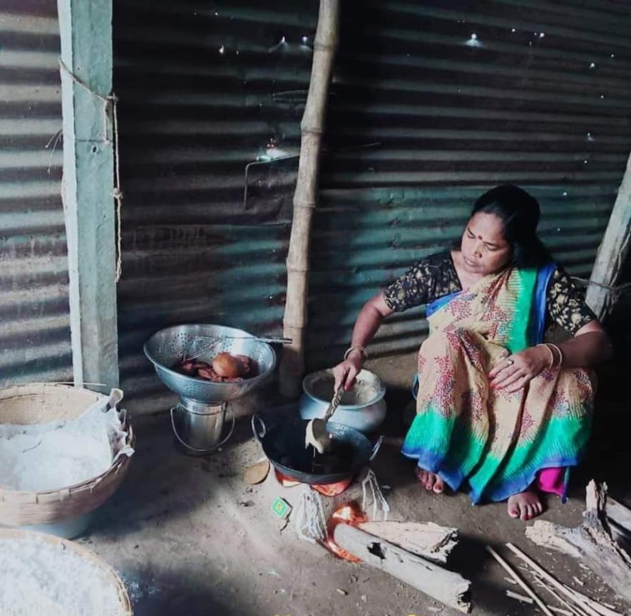 "Chatguri pithe” (rice cake) being prepared in Rospal village, Bankura .