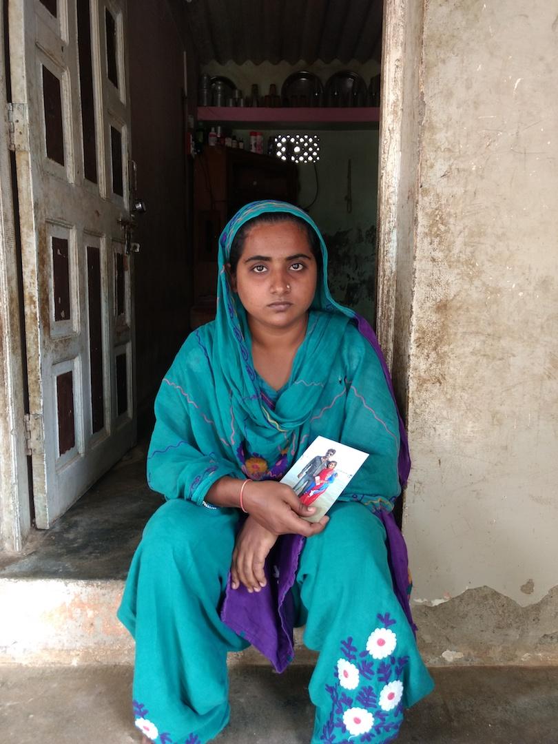 Ashiyana, wife of Majid holding their last photo clicked together .jpg